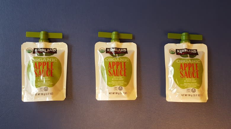 three pouches of applesauce