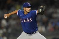 Texas Rangers' Dane Dunning delivers a pitch during the first inning of a baseball game against the New York Yankees Tuesday, Sept. 21, 2021, in New York. (AP Photo/Frank Franklin II)