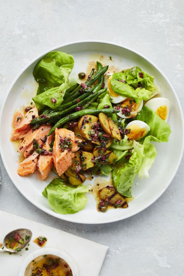 <p>Thanks to the lean protein and polyunsaturated fat, eating salmon as a part of a nutrient-dense, <a href="https://www.goodhousekeeping.com/food-recipes/healthy/g817/healthy-salmon-dinners/" rel="nofollow noopener" target="_blank" data-ylk="slk:veggie-filled meal;elm:context_link;itc:0" class="link ">veggie-filled meal</a> can help you stay satisfied longer, minimizing the urge to graze. Just be sure to skip calorie-laden toppings, sauces, breading, or deep-frying which will add saturated fat without any health-related upsides. </p>