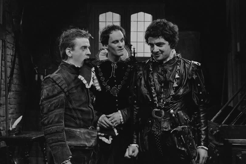 Philip Fox (left) with Tim McInnerny and Rowan Atkinson in a scene from the unaired pilot of the BBC television series 'Blackadder', June 20th 1982. Fox played the character of Baldrick in the pilot before Tony Robinson took over