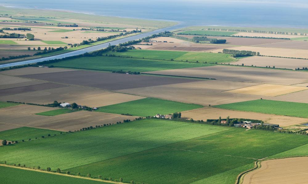 Aerial view of farmland in the UK countryside.