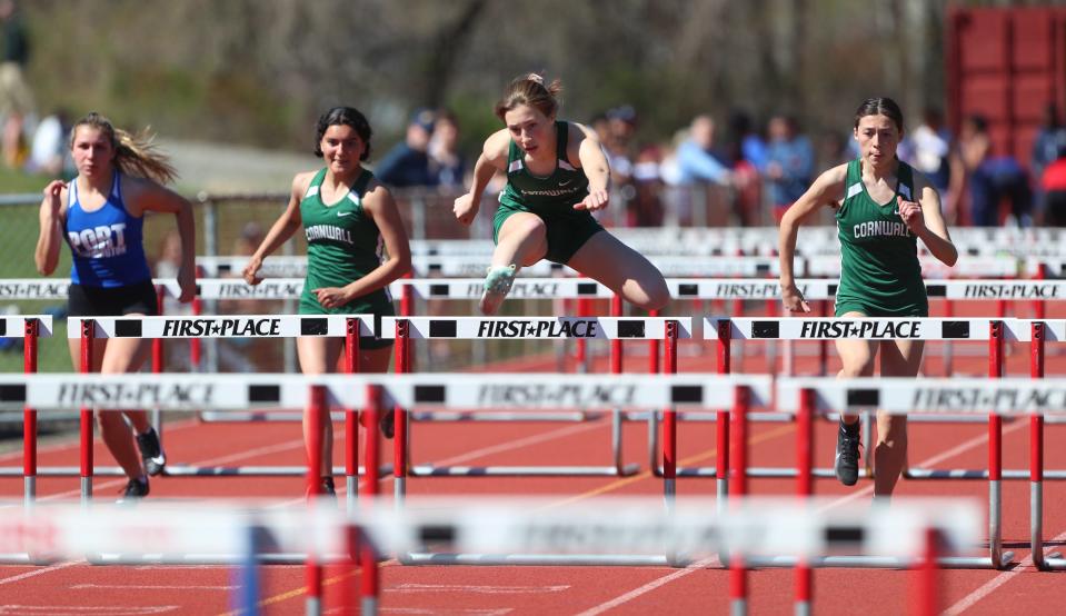 Conwall's Caigan Leonard runs in the 100-meter hurdles at the 34th annual Red Raider Relay's at North Rockland High School in Thiells on Friday, April 22, 2022.