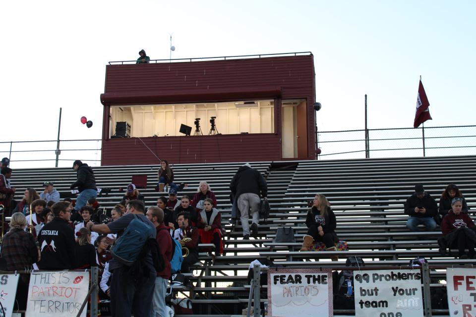 Ernie Mezey, Wayne Hills High School's football play-by-play announcer for the last 23 years climbs the 55 steps to get to the announcer's booth on Oct. 14, 2020.