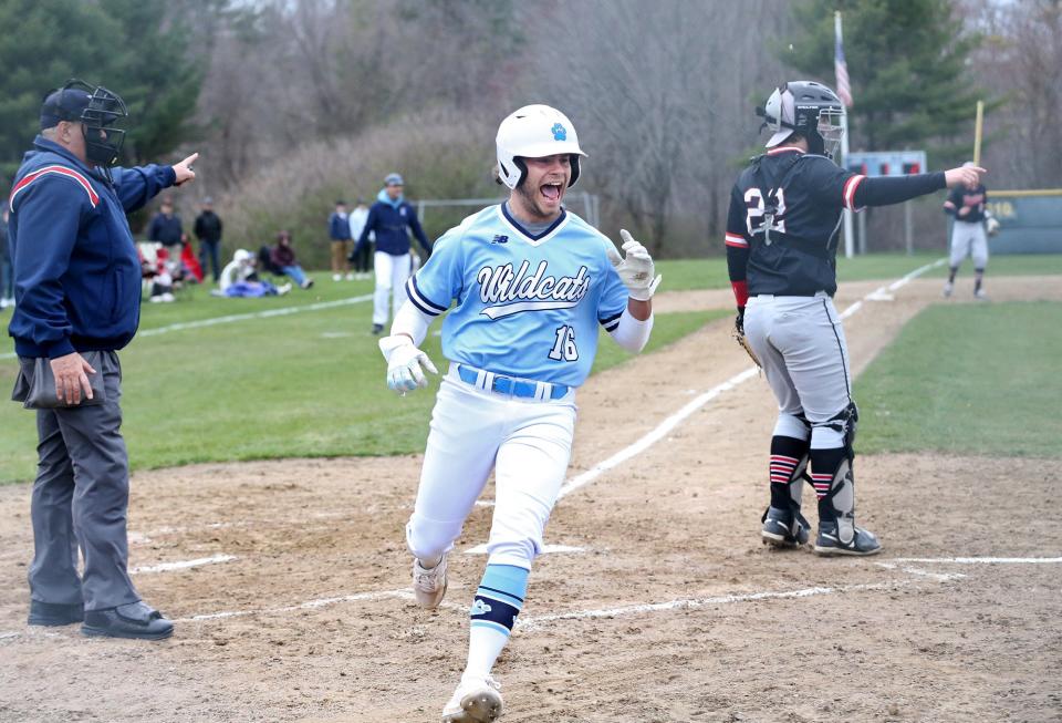 York's Hayden Henriksen shows his happiness after scoring a run against Wells earlier this season.