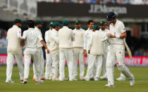 Cricket - England vs Pakistan - First Test - Lord's Cricket Ground, London, Britain - May 24, 2018 England's Stuart Broad reacts after losing his wicket as Pakistan's Mohammad Abbas celebrates Action Images via Reuters/John Sibley