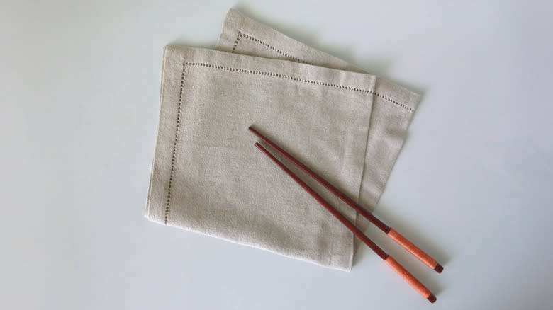 pair of chopsticks on napkin