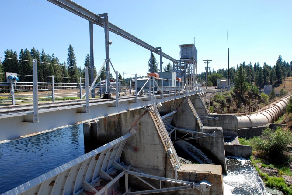 The J.C. Boyle Dam diverts water from the Klamath River to a powerhouse downstream.