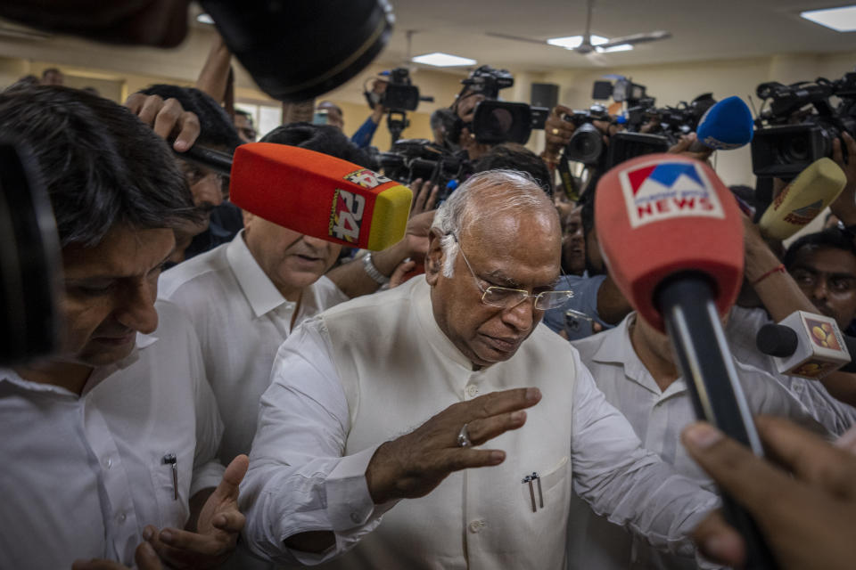 Senior Congress party leader Mallikarjun Kharge leaves after filing his nomination papers for Congress party president at the party's headquarter in New Delhi, India, Friday, Sept. 30, 2022. India’s main opposition Congress party, long led by the politically powerful Nehru-Gandhi family, is set to choose a non-family member as its next president after a gap of more than two decades. (AP Photo/Altaf Qadri)