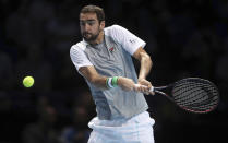 Croatia's Marin Cilic returns to Alexander Zverev during the ATP Men's Singles Final, at The O2 Arena in London, Monday Nov. 12, 2018. Cilic made 46 unforced errors as he gave up a break advantage in both sets in losing to Alexander Zverev on Monday. (Adam Davy/PA via AP)