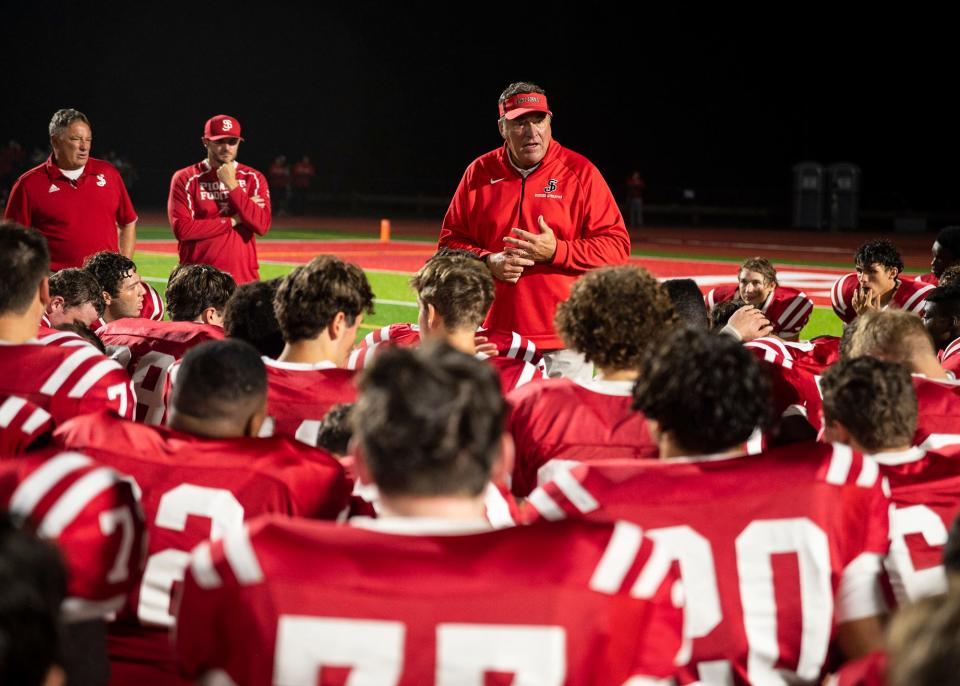 St. John's coach John Andreoli talks to the team after his 200th game as coach in 2021.