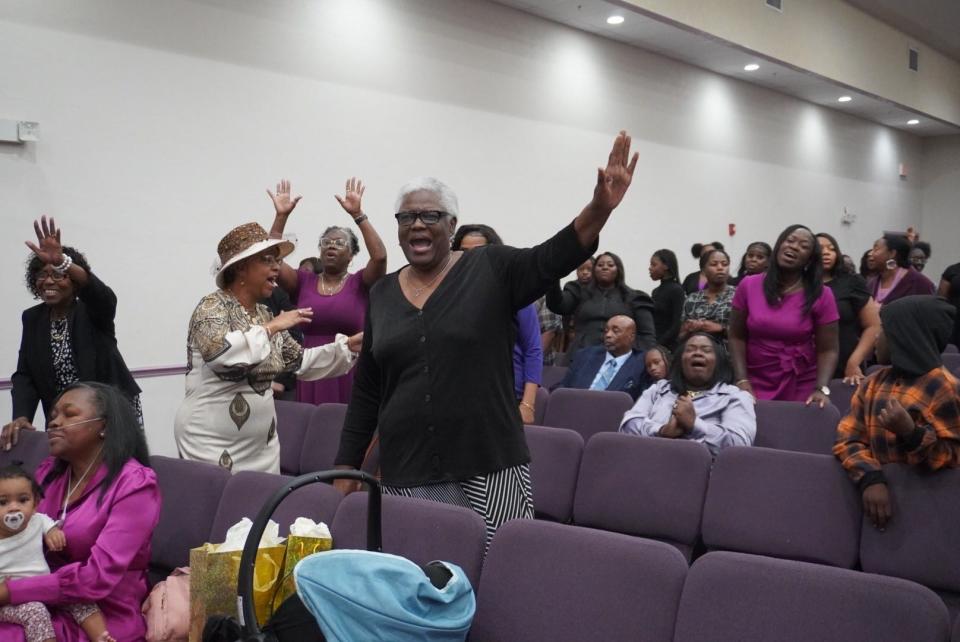 Parishioners praise and worship the Lord during a service Sunday at Upper Room Ministries to celebrate two of the leaders of the church, Pastor Karl Anderson and his wife, Lady Brecka Anderson, turning 50 recently.
(Credit: Photo by Voleer Thomas, Correspondent)