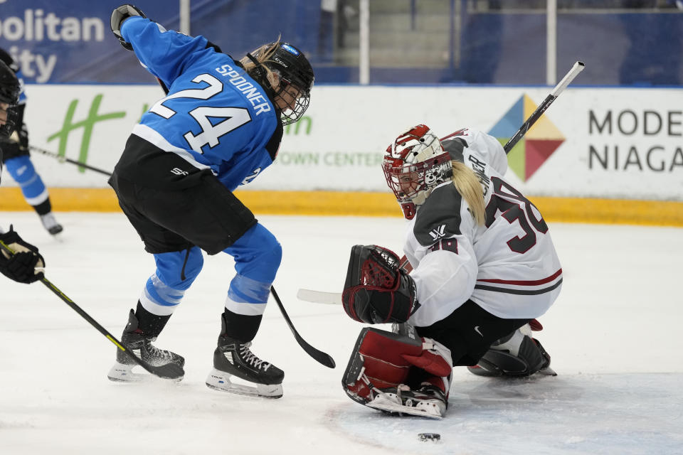 Ottawa goalie Emerance Maschmeyer, right, stops Toronto's Natalie Spooner (24) during second-period PWHL hockey game action in Toronto, Sunday, May 5, 2024. (Frank Gunn/The Canadian Press via AP)