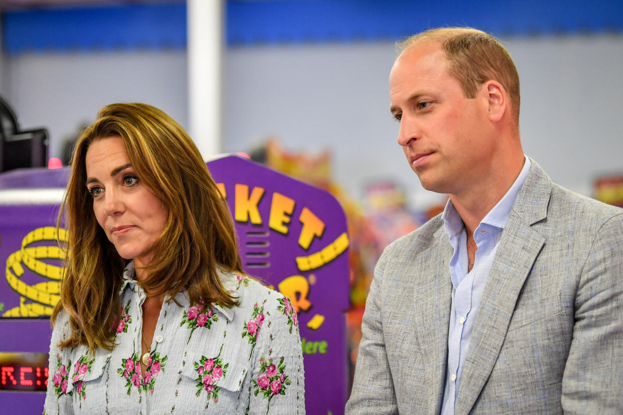 BARRY, WALES - AUGUST 05:  Prince William, Duke of Cambridge and Catherine, Duchess of Cambridge at Island Leisure Amusement Arcade, where Gavin and Stacey was filmed, during their visit to Barry Island, South Wales, to speak to local business owners about the impact of COVID-19 on the tourism sector on August 5, 2020 in Barry, Wales. (Photo by Ben Birchall - WPA Pool/Getty Images)