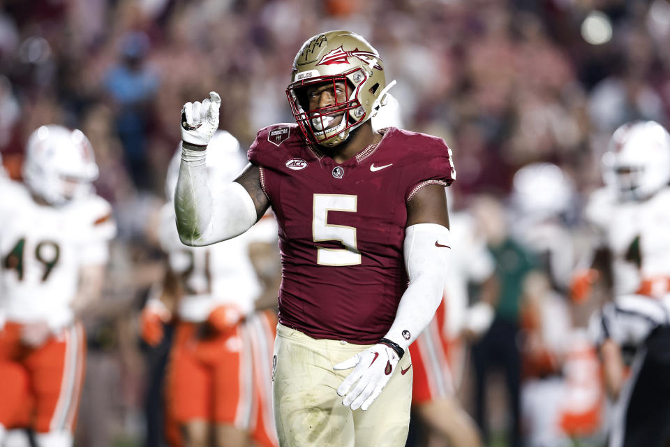 TALLAHASSEE, FL - NOVEMBER 11: Defensive End Jared Verse #5 of the Florida State Seminoles shows the fans that he was inches from making a sack during the game against the Miami Hurricanes at Bobby Bowden Field at Doak Campbell Stadium on November 11, 2023 in Tallahassee, Florida. The 4th ranked Seminoles defeated the Hurricanes 27-20. (Photo by Don Juan Moore/Getty Images)