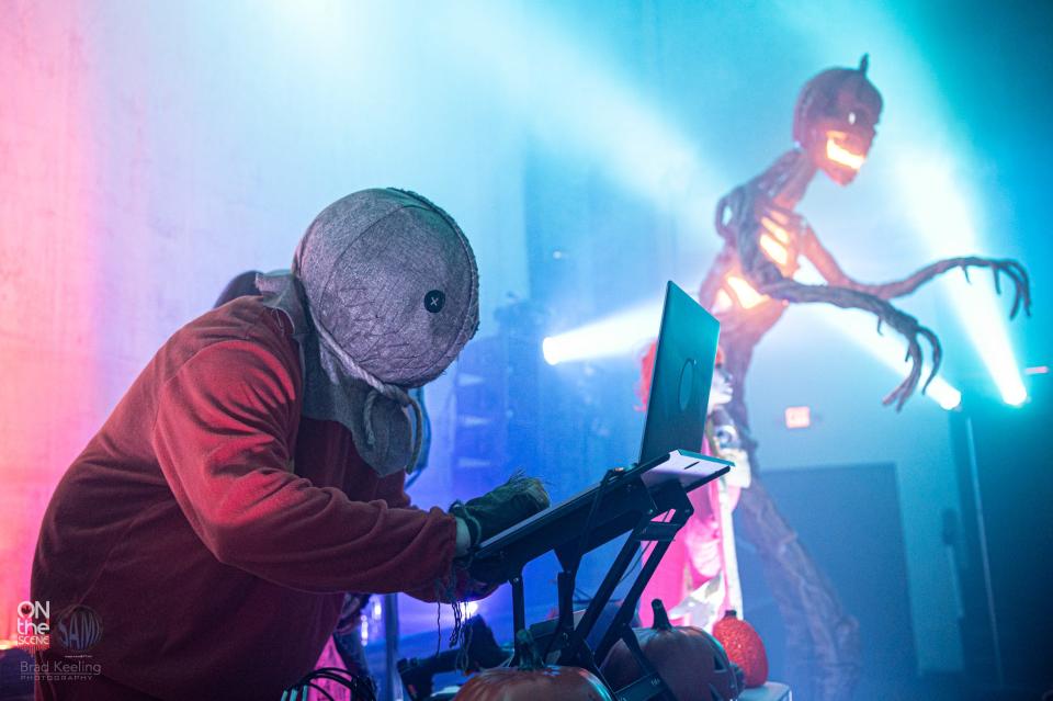 A DJ dressed up as Sam from the movie "Trick 'r Treat" entertains partygoers at the fourth annual Halloween Monster Ball at the Abou Ben Adhem Shrine in October 2022.