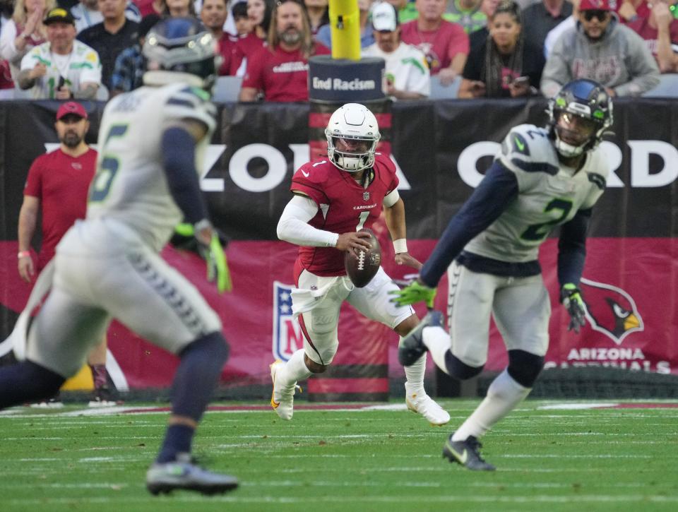 Jan 9, 2022; Glendale, Arizona, USA; Arizona Cardinals quarterback Kyler Murray (1) scrambles against the Seattle Seahawks during the first quarter. Mandatory Credit: Michael Chow-Arizona Republic