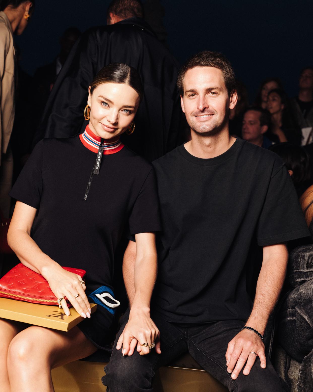 PARIS, FRANCE - JUNE 20: (L-R) Miranda Kerr and Evan Spiegel attend the the Louis Vuitton Menswear Spring/Summer 2024 show as part of Paris Fashion Week  on June 20, 2023 in Paris, France. (Photo by Pierre Mouton/Getty Images for Louis Vuitton) ORG XMIT: 775992834 ORIG FILE ID: 1500248432