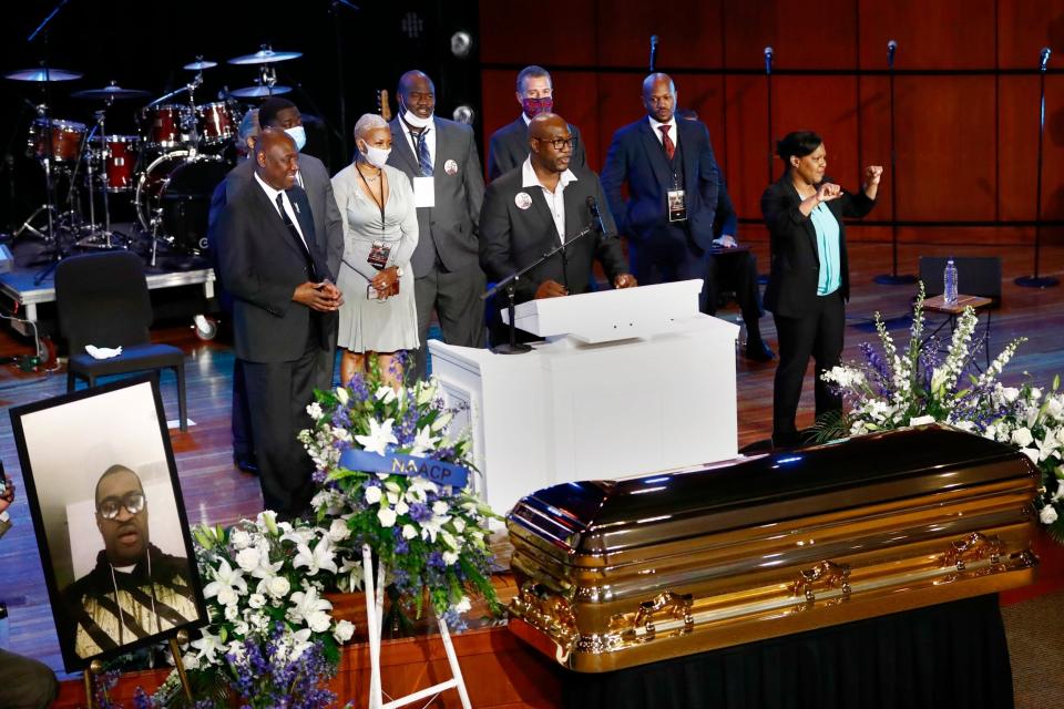 Politicians and family members gathered at the memorial (AP)