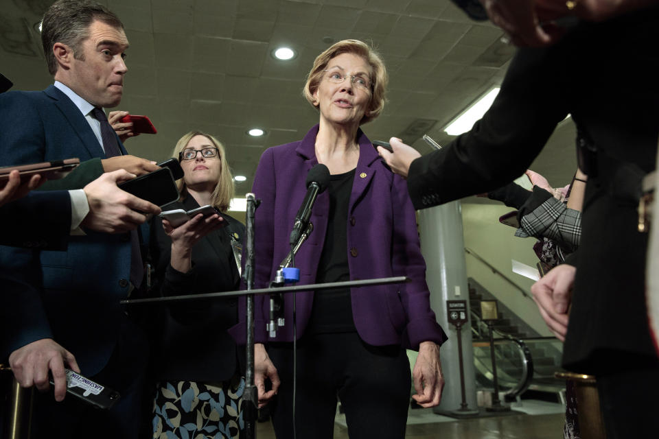 Democratic Presidential candidate Sen. Elizabeth Warren, D-Mass., speaks to the media before attending the impeachment trial of President Donald Trump on charges of abuse of power and obstruction of Congress, Thursday, Jan. 23, 2020, on Capitol Hill in Washington. (AP Photo/ Jacquelyn Martin)