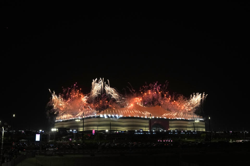 Fireworks explode over the Al Bayt Stadium before the start of the World Cup, group A soccer match between Qatar and Ecuador in Al Khor, Qatar, Sunday, Nov. 20, 2022. (AP Photo/Alessandra Tarantino)