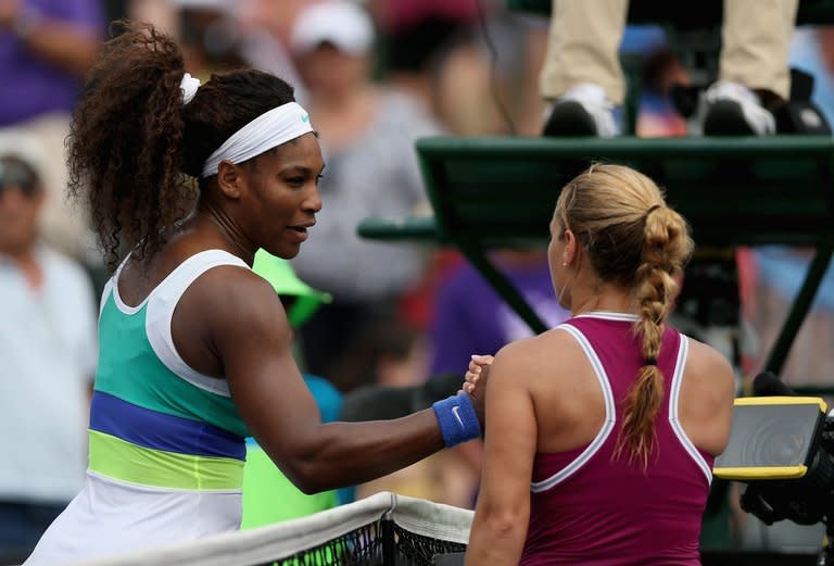 Serena Williams shakes hands with Dominika Cibulkova after beating the Slovakian on March 25, 2013. Williams struggled, having to come from a set down to win 2-6, 6-4, 6-2