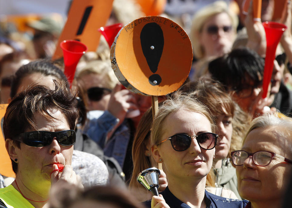 Teachers from across Poland gather in Warsaw, Tuesday, April 23, 2019. The teachers demand higher wages in a long-running dispute that is emerging as another fissure in a deeply divided society. (AP Photo/Czarek Sokolowski)