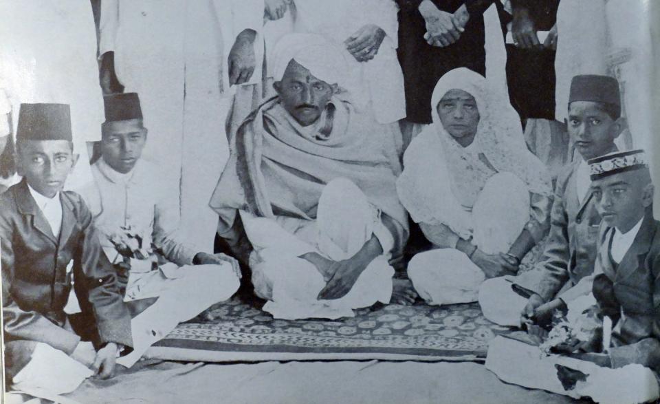 Mohandas Karamchand Gandhi and Kasturba. at a reception given in Ahmedabad. 1915. Gandhi (2 October 1869 Ð 30 January 1948). was the preeminent leader of the Indian independence movement in British-ruled India. Employing nonviolent civil disobedience. Gandhi led India to independence and inspired movements for civil rights and freedom across the world. (Photo by: Universal History Archive/Universal Images Group via Getty Images)