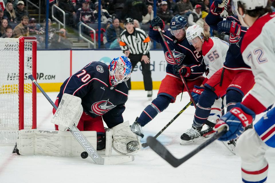 Nov 17, 2022; Columbus, Ohio, USA;  Columbus Blue Jackets goaltender Joonas Korpisalo (70) stops a shot during the second period of the NHL hockey game against the Montreal Canadiens at Nationwide Arena. Mandatory Credit: Adam Cairns-The Columbus Dispatch