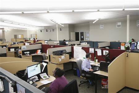 Customer service agents at Covered California's Concord call center work during the opening day of enrollment of the Patient Protection and Affordable Care Act in Concord, California October 1, 2013. REUTERS/Stephen Lam