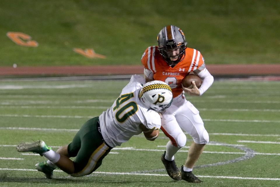 Pampa's Bensin Martinez (40) tackles Caprock's Lleyten Brown (8), Thursday, Sept. 8, 2022, at Dick Bivins Stadium. 