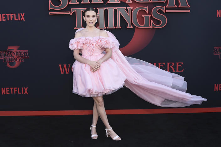 FILE - Millie Bobby Brown arrives at the season three premiere of "Stranger Things" at Santa Monica High School on Friday, June 28, 2019, in Santa Monica, Calif. Brown turns 18 on Feb. 19. (Photo by Jordan Strauss/Invision/AP, File)