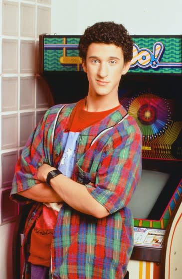 Young Dustin Diamond posing for a "Saved by the Bell" promo photo