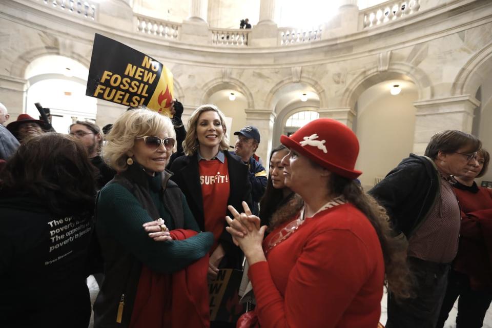 <div class="inline-image__caption"><p>Jane Fonda, June Diane Raphael and Abigail Disney demonstrate inside the Russell U.S. Senate office building during "Fire Drill Friday" climate change protest on November 15, 2019, in Washington, D.C.</p></div> <div class="inline-image__credit">John Lamparski/Getty</div>