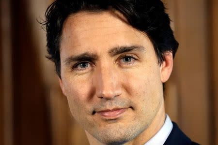 Canada's Prime Minister Justin Trudeau poses following an interview with Reuters in his office on Parliament Hill in Ottawa, Ontario, Canada, May 19, 2016. REUTERS/Chris Wattie