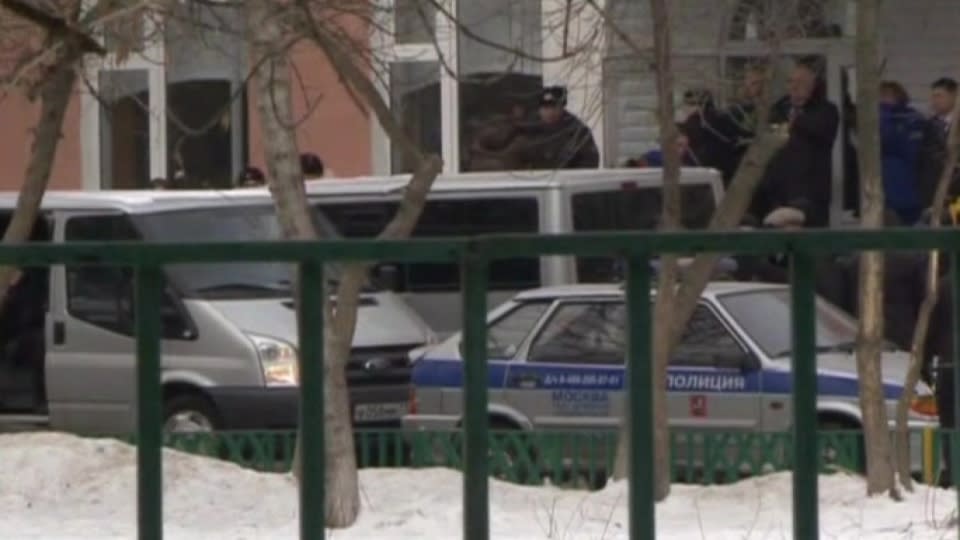 A Moscow high-school student shoots dead a police officer and a teacher and holds more than 20 students hostage before he is disarmed and detained. Rough Cut. (No Reporter Narration).