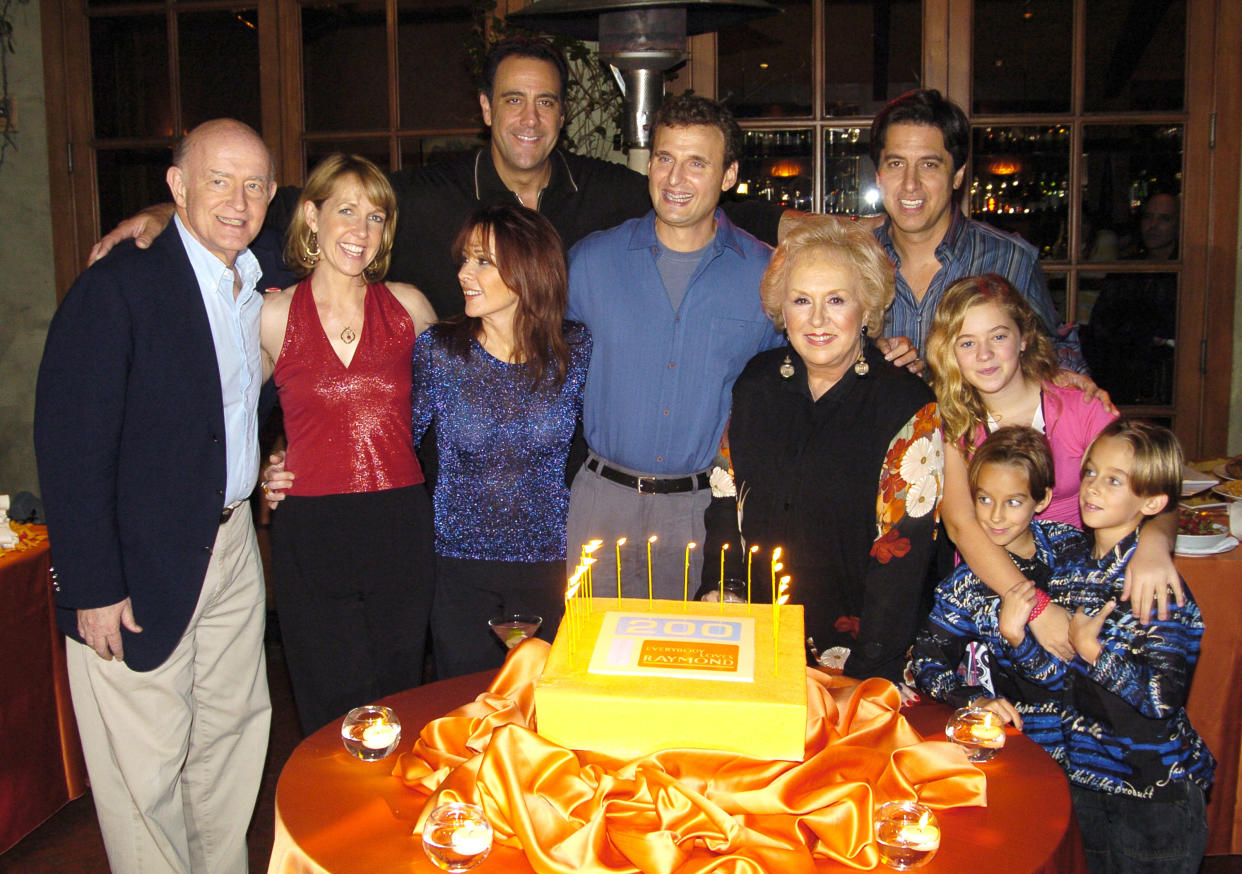 Peter Boyle, Monica Horan, Brad Garrett, Patricia Heaton, Phil Rosenthal, creator, Doris Roberts, Ray Romano, Madylin Sweeten, Sawyer Sweeten and Sullivan Sweeten and - the cast of Everybody Loves Raymond (Photo by Jeff Kravitz/FilmMagic, Inc)