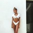 <p>Why wear a plain T-shirt when you can turn it into a bikini top?</p>