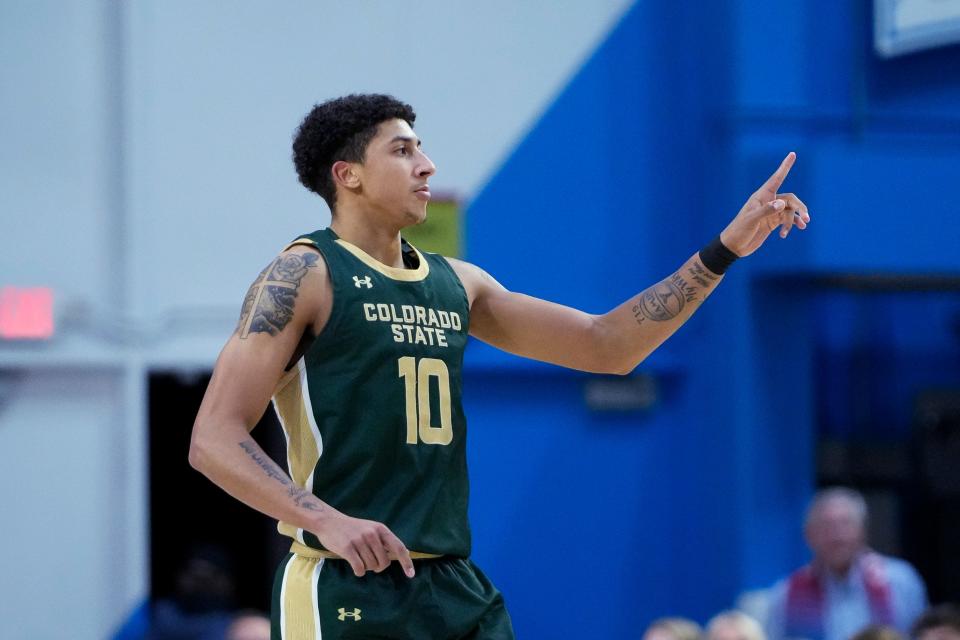 Colorado State guard Nique Clifford reacts after making a 3-point basket against Loyola Marymount during the first half of an NCAA college basketball game Friday, Dec. 22, 2023, in Los Angeles. (AP Photo/Ryan Sun)