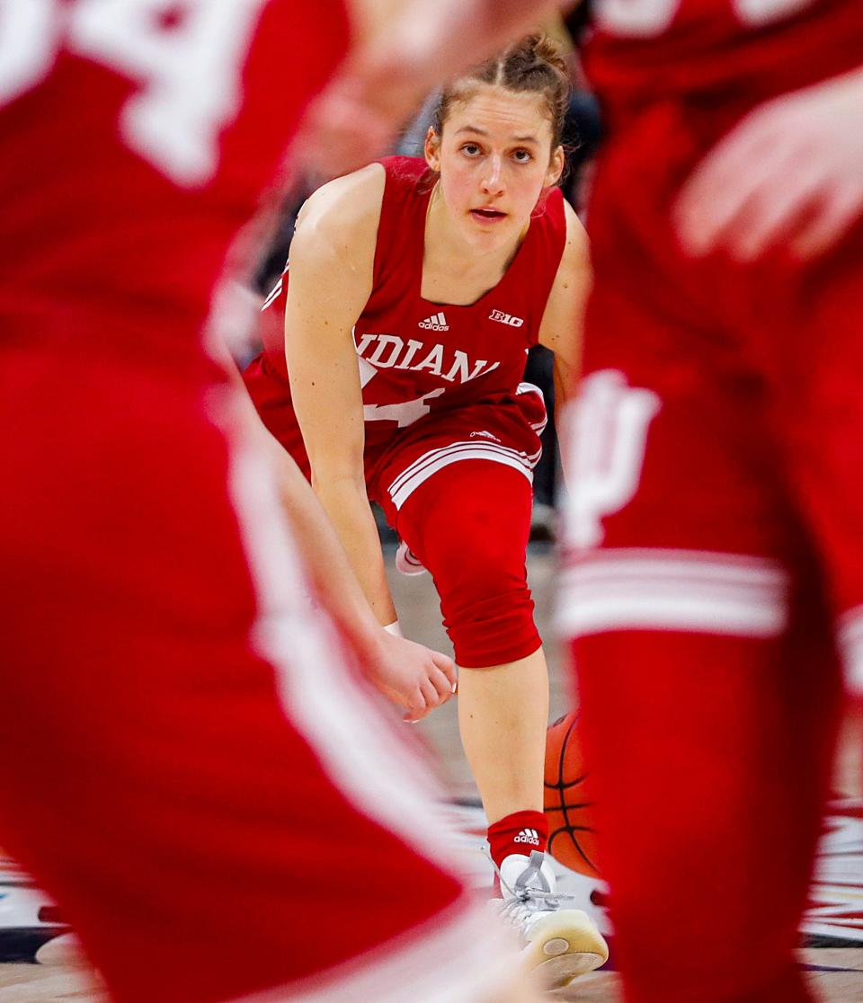 Indiana Hoosiers guard Ali Patberg (14) dribbles the ball during the women’s Big Ten tournament game against the Ohio State Buckeyes, Saturday, March 5, 2022, at Gainbridge Fieldhouse in Indianapolis. Indiana won 70-62. 