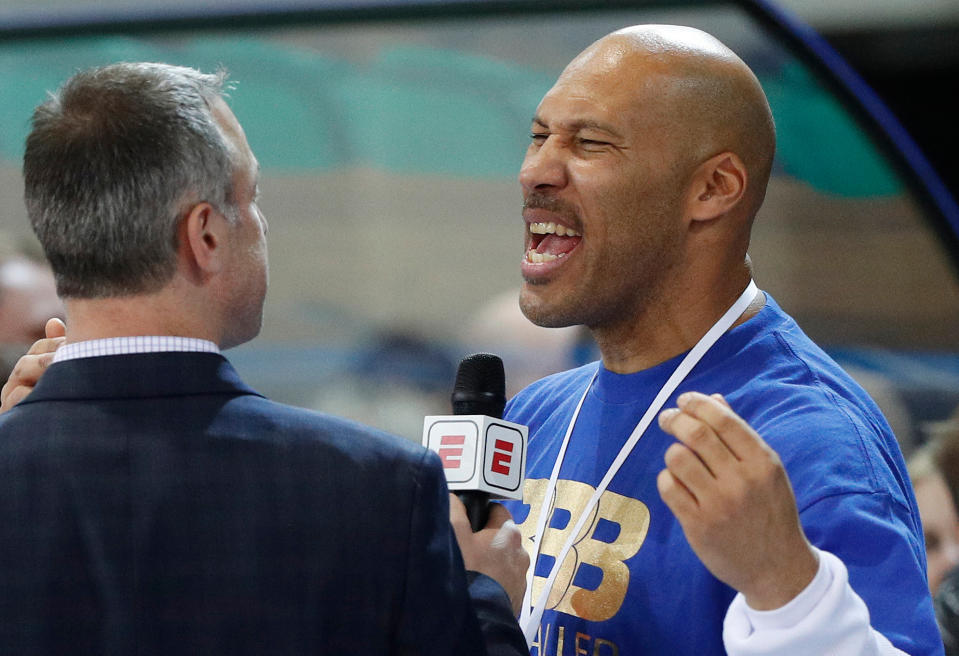 LaVar Ball is interviewed after a basketball game in Prienai, Lithuania. LiAngelo and LaMelo Ball are leaving their Lithuania team by mutual agreement. BC Prienu Vytautas on Thursday, April 26, 2018, announced the departure of the younger brothers of Los Angeles Lakers rookie Lonzo Ball. Lithuanian basketball writer Donatas Urbonas says on Twitter that father LaVar Ball told him he was upset over LaMelo's diminished playing time.(AP Photo/Liusjenas Kulbis, File)