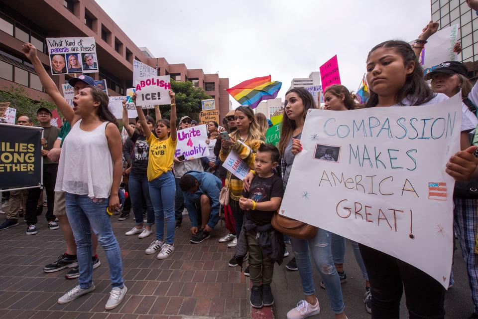 <p>People rally near the Edward J. Schwartz Federal Building to demand that thousands of children taken from their immigrant parents by border officials under recent controversial Trump administration policies be reunited on June 23, 2018 in San Diego, Calif. (Photo: David McNew/AFP/Getty Images) </p>