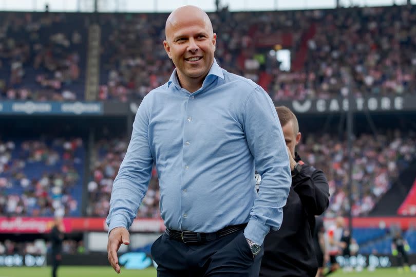 Arne Slot walks along the touchline ahead of Feyenoord's game against Excelsior, his final game before taking charge of Liverpool