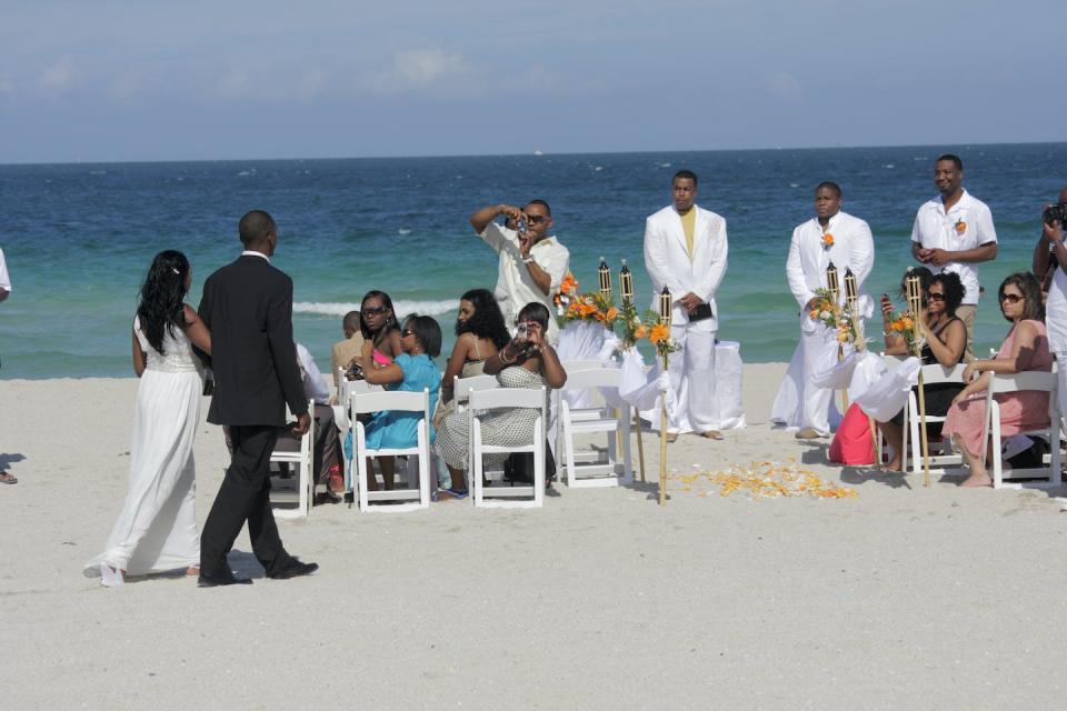 In the author’s interviews, many of the men credit their partners with making them better husbands, fathers and men. <a href="https://www.gettyimages.com/detail/news-photo/wedding-ceremony-on-miami-beach-news-photo/813794538?adppopup=true" rel="nofollow noopener" target="_blank" data-ylk="slk:Jeffrey Greenberg/Universal Images Group via Getty Images;elm:context_link;itc:0;sec:content-canvas" class="link ">Jeffrey Greenberg/Universal Images Group via Getty Images</a>