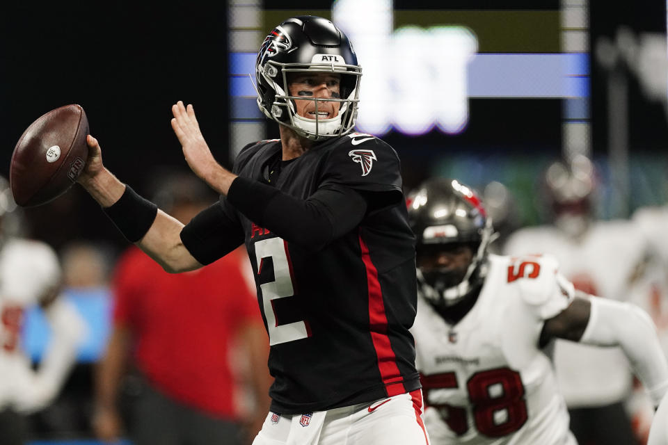 Atlanta Falcons quarterback Matt Ryan (2) works in the pocket against the Tampa Bay Buccaneers during the first half of an NFL football game, Sunday, Dec. 5, 2021, in Atlanta. (AP Photo/John Bazemore)