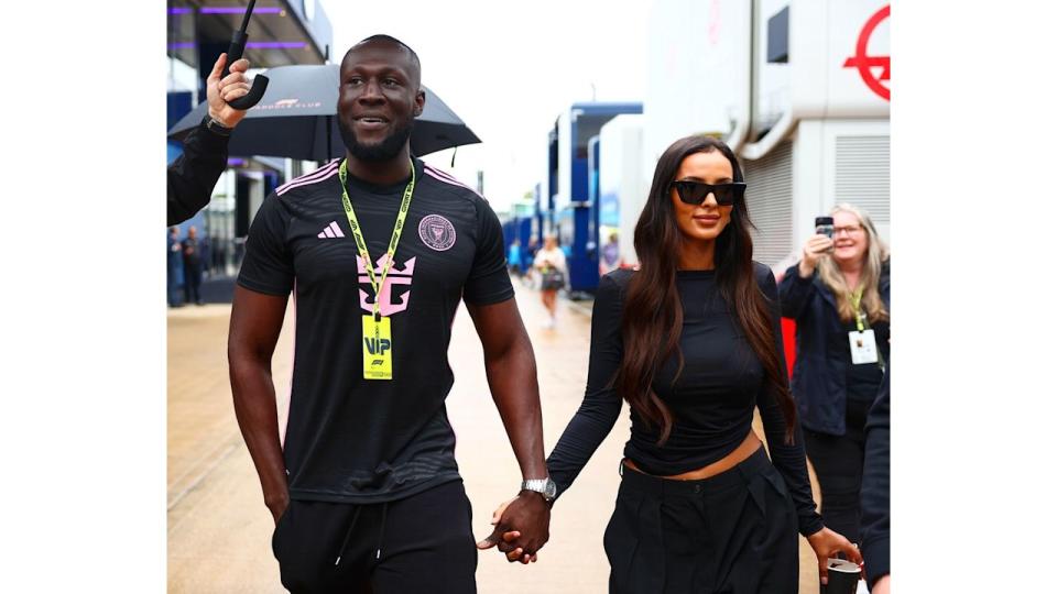 Stormzy and Maya Jama hold hands