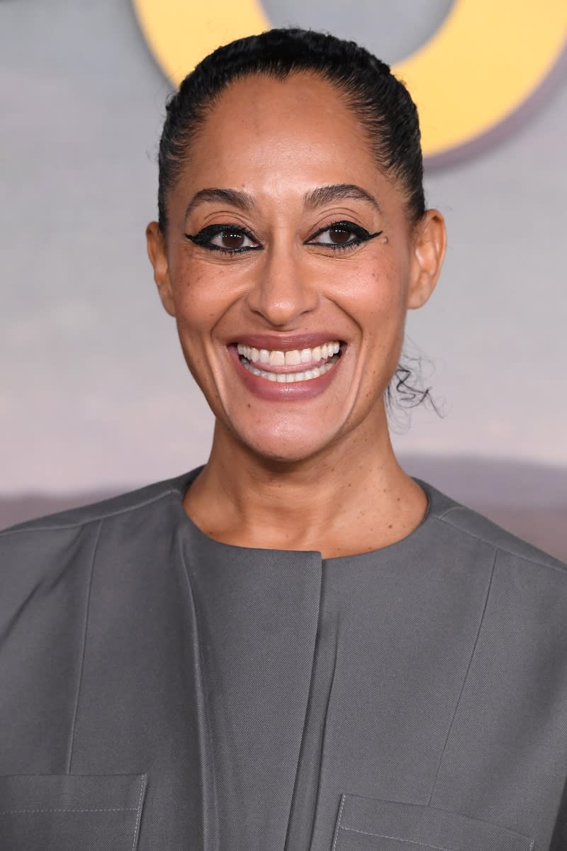Tracee Ellis Ross, with a slicked back hair look, arrives at the Los Angeles Premiere For Peacock Original Series 