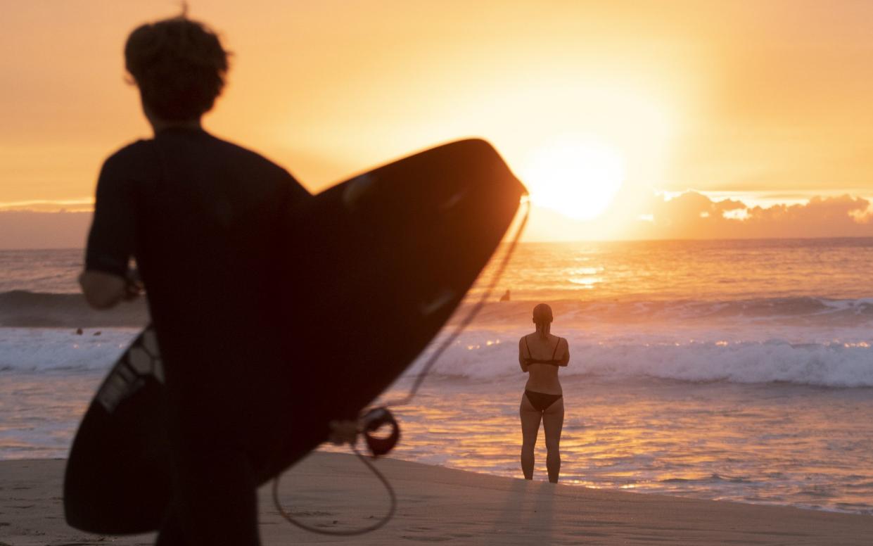 Swimmers and surfers return to Maroubra beach on April 20, 2020 in Sydney, Australia - GETTY IMAGES