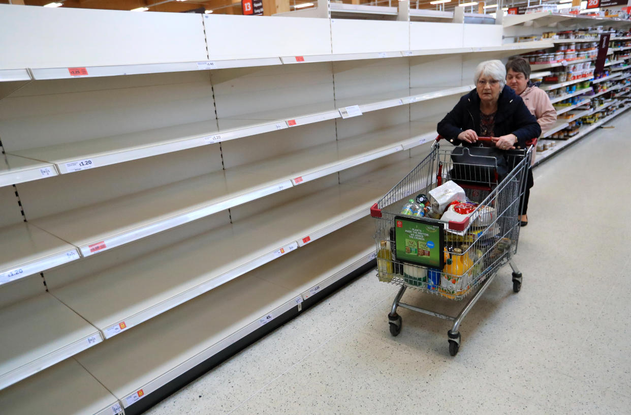 File photo dated 19/03/2020 of empty shelves at a Sainsburys. The boss of the Food and Drink Federation has said that the days when UK consumers could expect to pick up nearly whatever product they want whenever they want from supermarket shelves are over. Ian Wright, the body's chief executive, said that a shortage of lorry drivers is in part due to them moving to online retailers and starting to deliver for Amazon and Tesco. Issue date: Friday September 10, 2021.