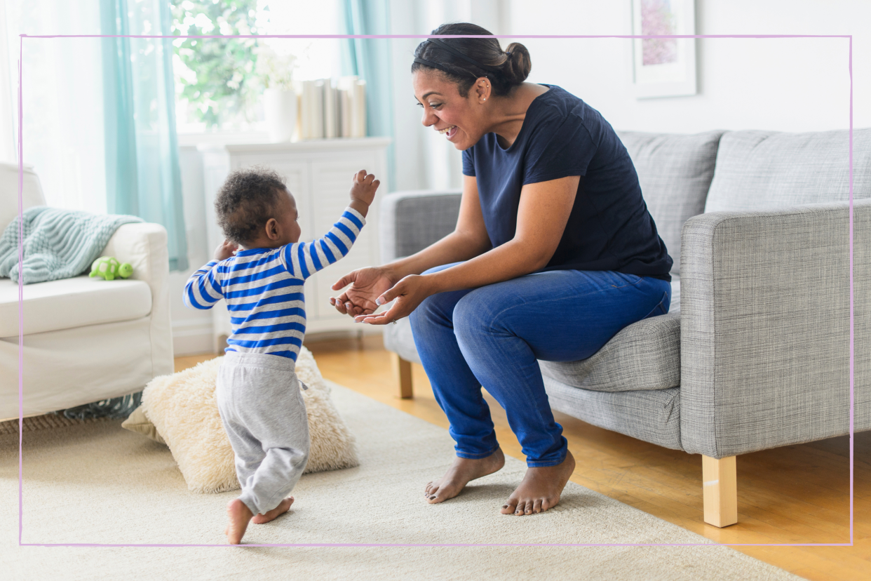  Mother celebrating developmental stages in her son. 