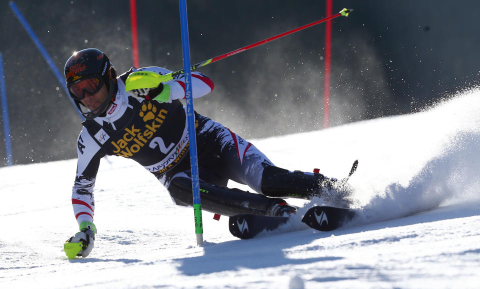 Mario Matt of Austria competes during the first run of an alpine ski, men's World Cup slalom in Kranjska Gora, Slovenia, Sunday, March 9, 2014. (AP Photo/Giovanni Auletta)